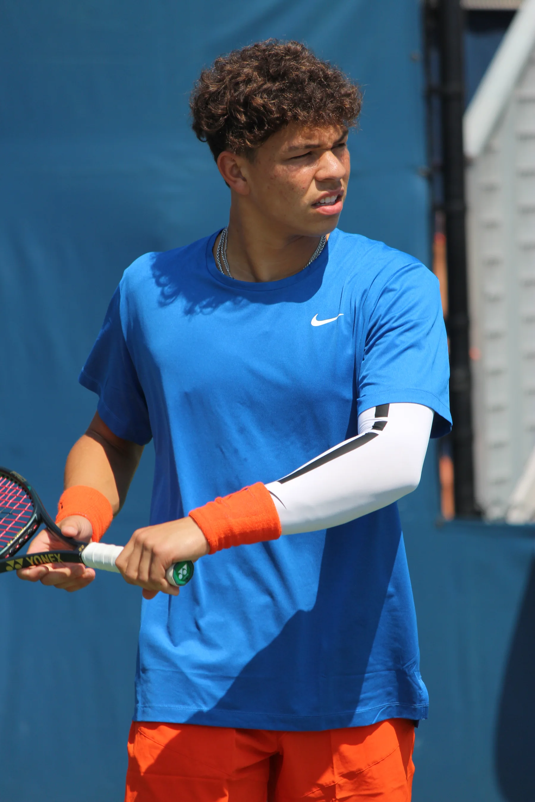 Ben Shelton holding his racket during the 2022 US Open