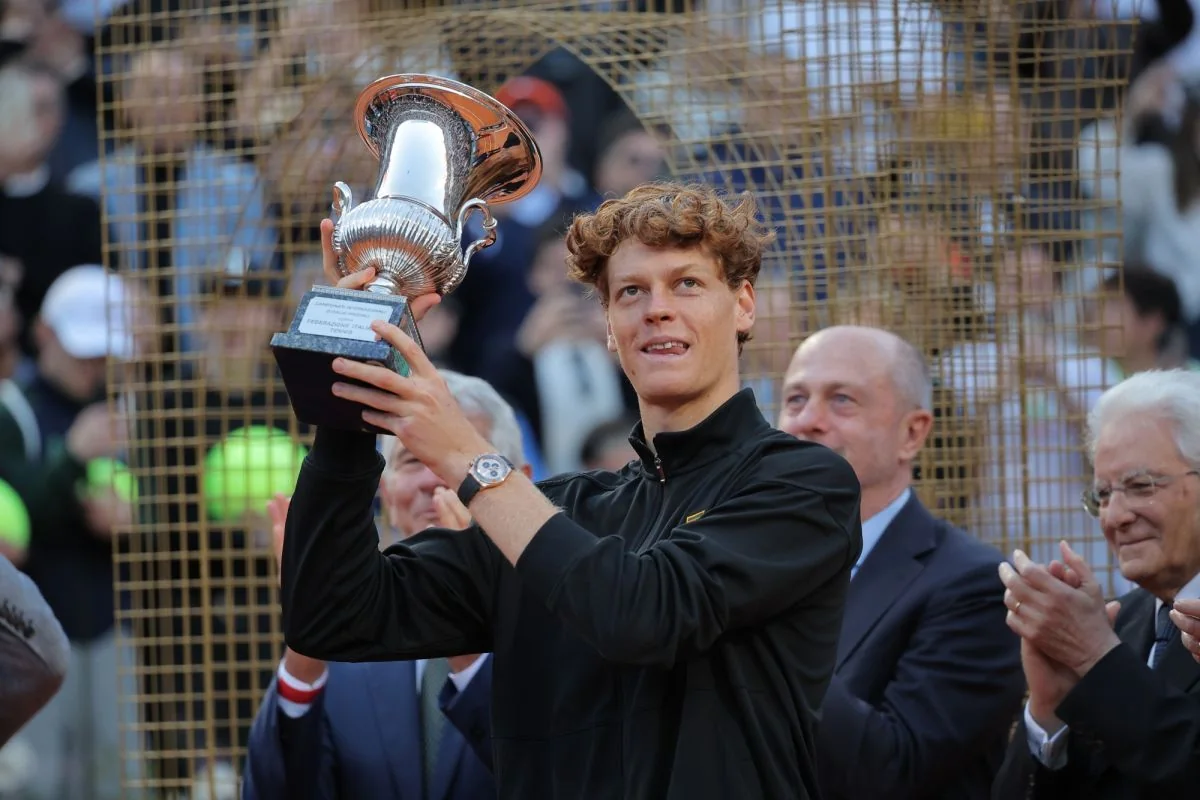 Jannik Sinner lifting the 2026 Rome trophy