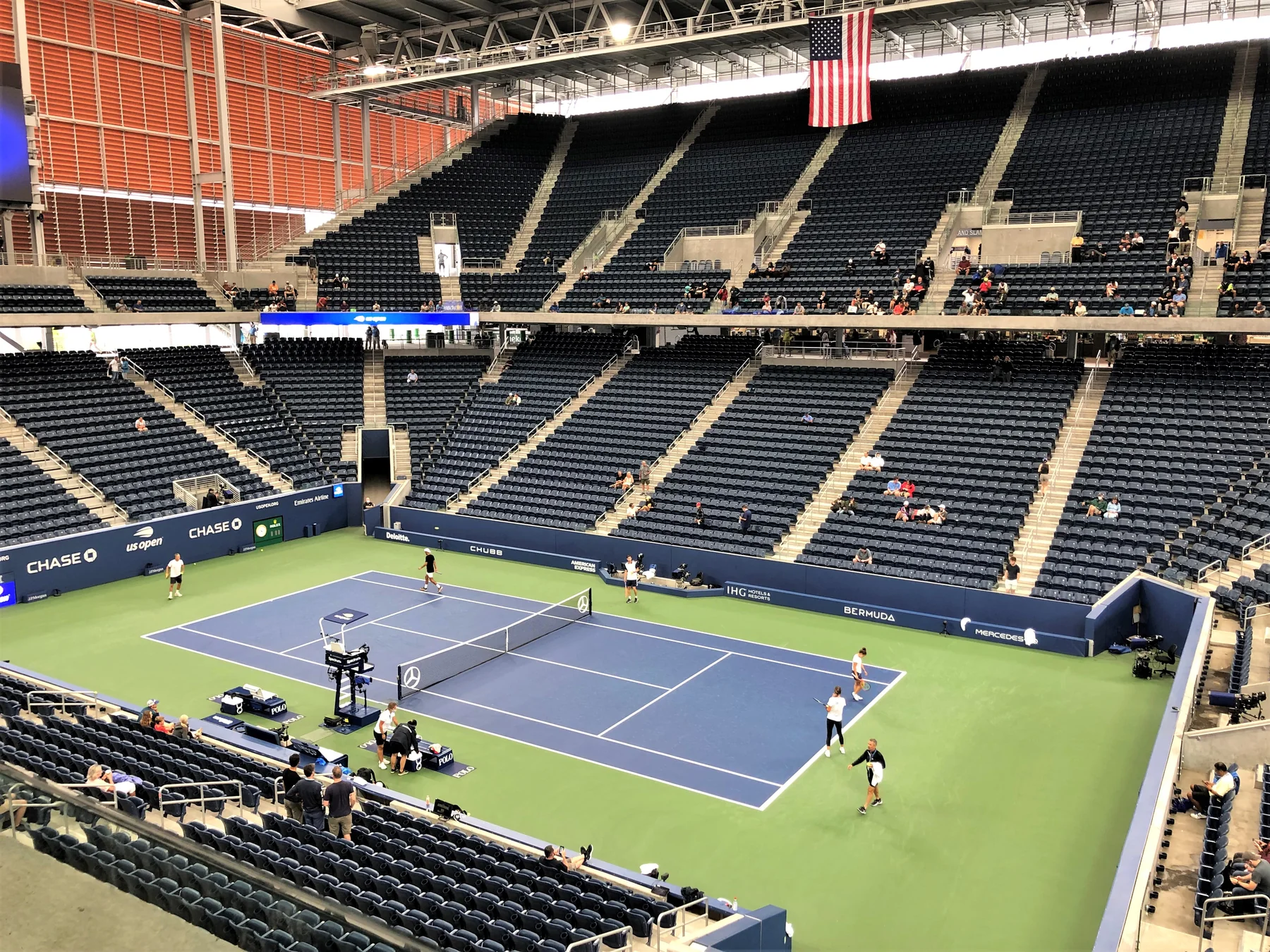 Interior of Arthur Ashe Stadium with multiple seating levels